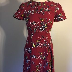Knee length red bird dress size xs
